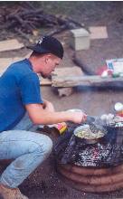 Kelly frying up snake fajitas